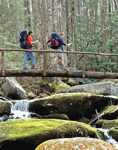 Hiking over a bridge