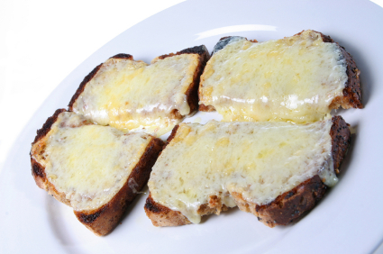 Toasted granary bread with melted cheddar cheese